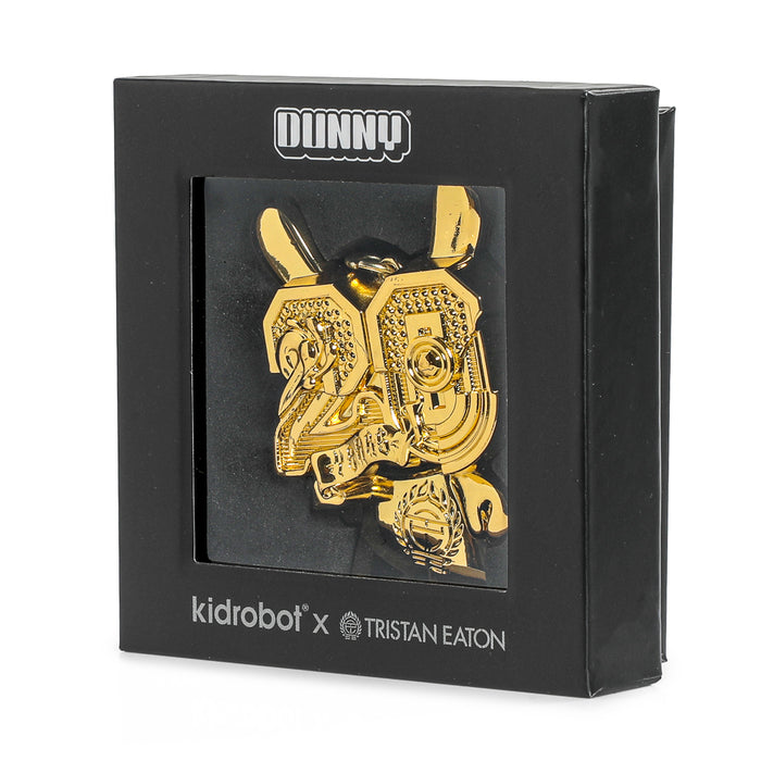 Goldchrome 20th Anniversary Dunny keychain by Tristan Eaton, limited edition solid metal collectible, featuring detailed design.