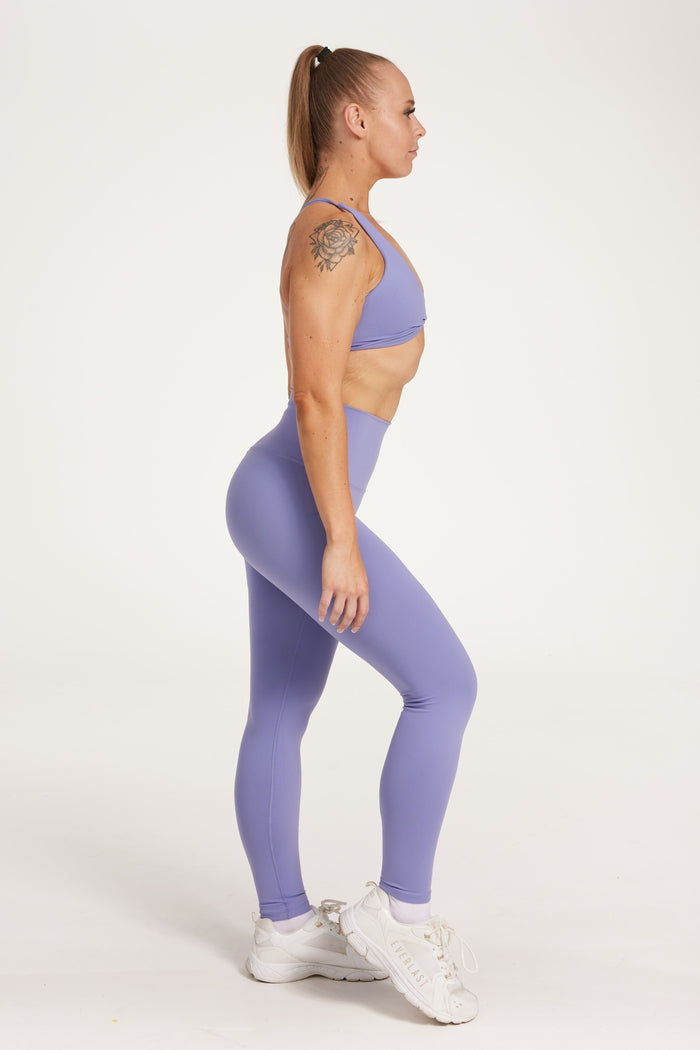 high waisted buttery soft, supportive activewear tights, with no front rise seam in lavender
