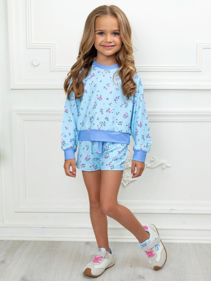 Girls floral short set featuring delicate blue and pink flowers