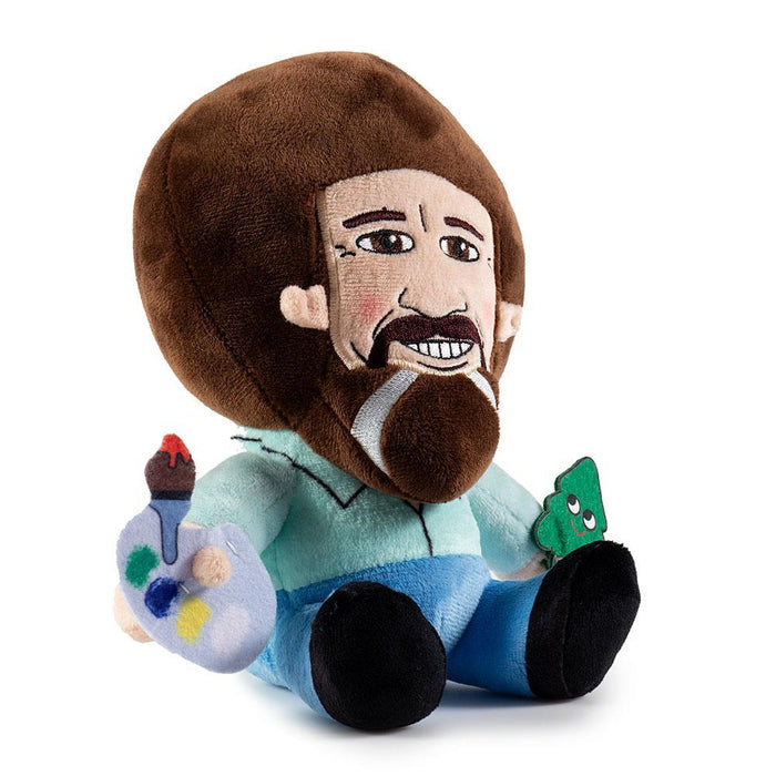 Soft Bob Ross Plush Phunny by Kidrobot showing Bob Ross's face with curly hair and signature smile, ideal for collectors and fans.
