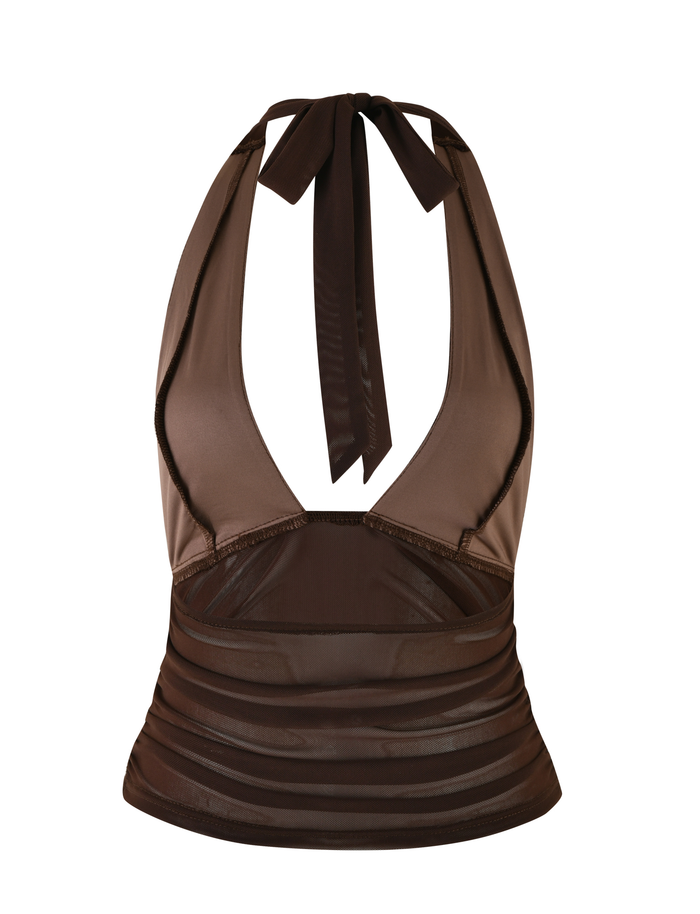 The BRESILY TOP - BROWN : CHOCOLATE by TIGERMIST is a halter neck crop top with a deep V neckline, mesh panels, and a tie neck closure. The fitted fabric features subtle ruching at the lower band for added detail.