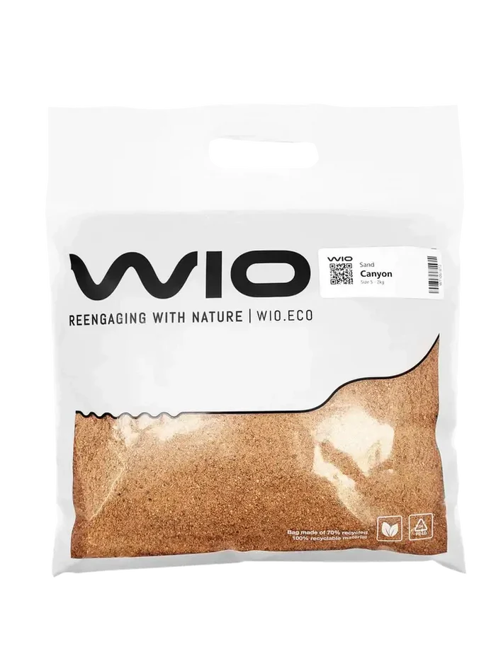 Wio Canyon Sand bag with transparent window showing light brown granules
