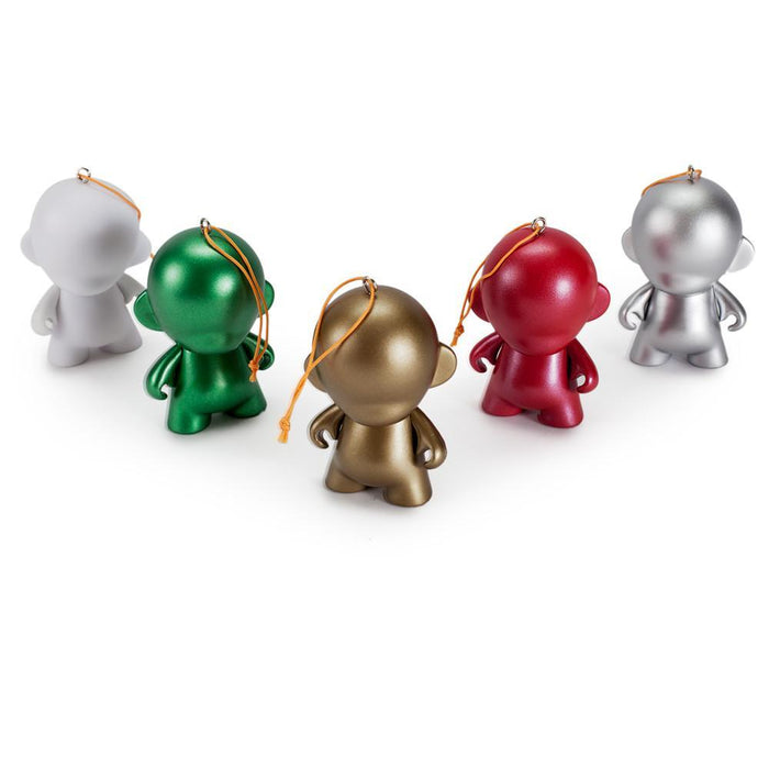 Set of five customizable DIY MUNNY World ornaments by Kidrobot featuring Tristan Eaton vinyl figures for creative decorating.