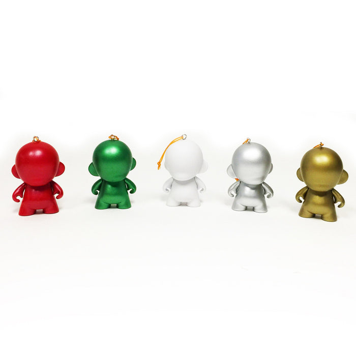 Set of five customizable DIY MUNNY World vinyl ornaments by Kidrobot featuring colorful, playful designs by Tristan Eaton.