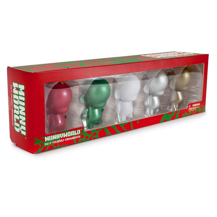 Set of five customizable DIY MUNNY World ornaments by Kidrobot featuring Tristan Eaton vinyl designs on a festive display.