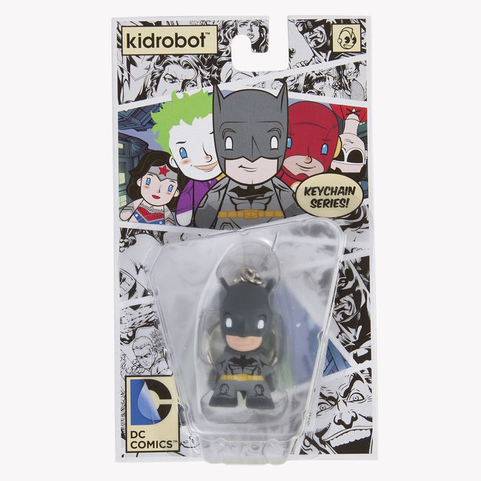 Gray vinyl and metal Batman keychain from DC Universe by Warner Bros., featuring the iconic superhero logo and design.