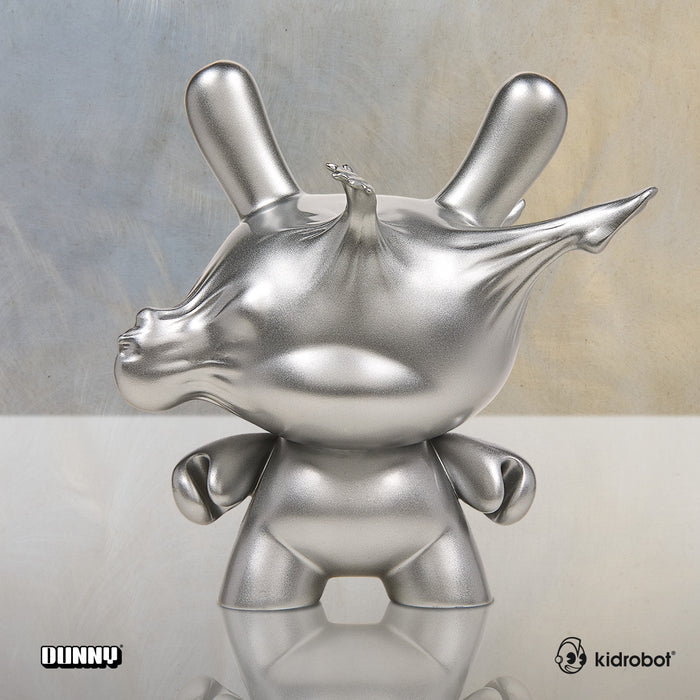 8-inch metallic silver resin Dunny by WHATSHISNAME from the DCON 2022 Breaking Free limited edition collection.