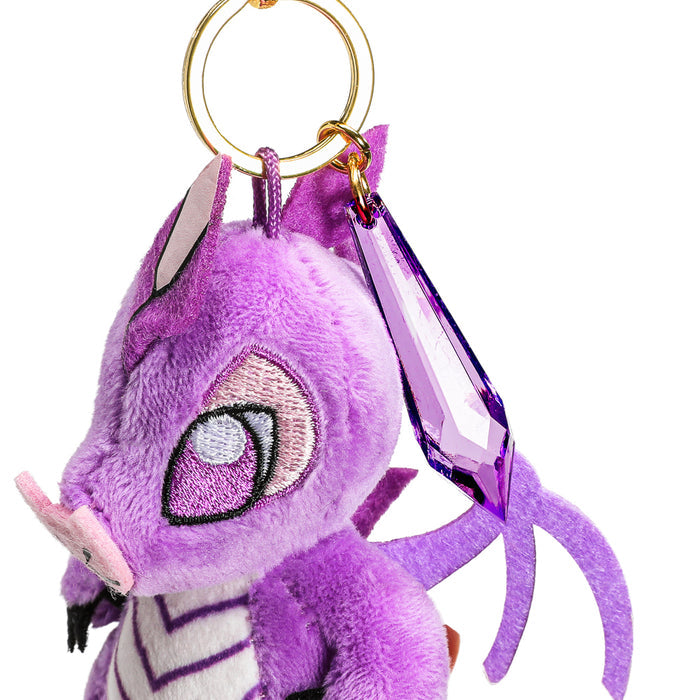 Dungeons & Dragons 50th Anniversary Wyrmlings plush collectible charms, 3-inch soft plush toys with colorful dragon designs.