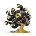 Dungeons & Dragons Beholder 7-inch resin art figure in black and gold, celebrating the 50th anniversary, by Kidrobot.