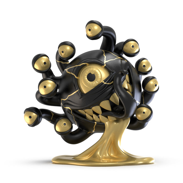 Dungeons & Dragons Beholder 7-inch resin art figure in black and gold, 50th anniversary edition by Kidrobot.