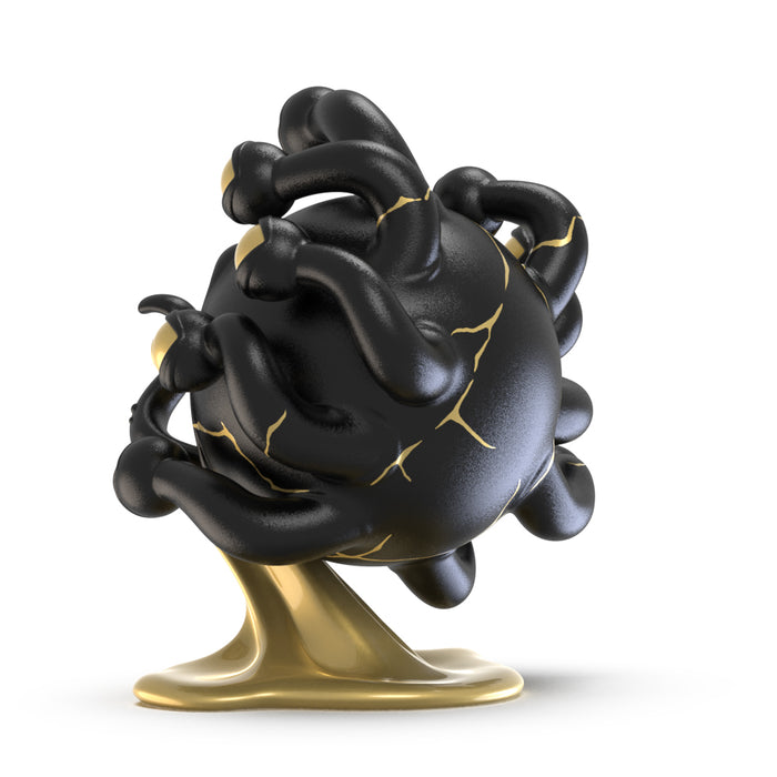 Dungeons & Dragons Beholder 7-inch resin art figure in black and gold, 50th Anniversary Edition by Kidrobot.