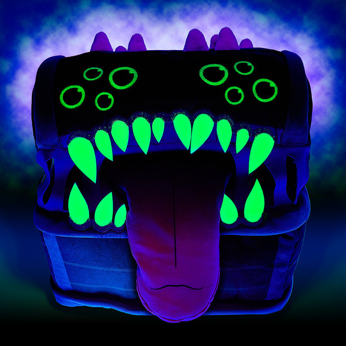 Dungeons & Dragons Honor Among Thieves Mimic glow-in-the-dark plush, 11-inch soft toy featuring the iconic monster from the game.