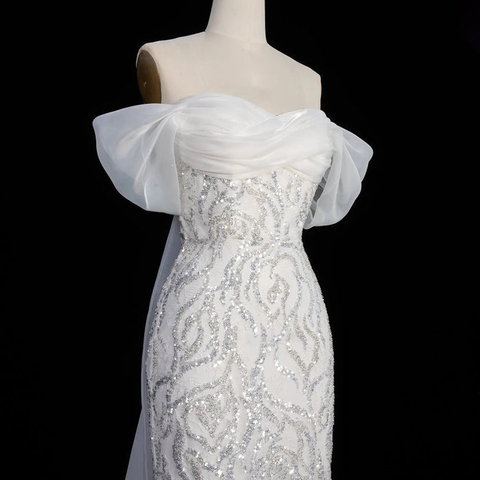 Elegant Off-Shoulder White Mermaid Evening Dress Beaded with Train SS636