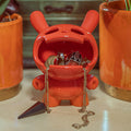 Kidrobot Fine Ash Dunny 5-inch ceramic ashtray figure in Sunset Orange with detailed design and glossy finish.