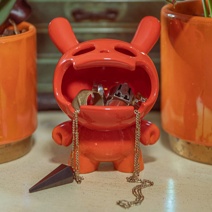 Kidrobot Fine Ash Dunny 5-inch ceramic ashtray figure in Sunset Orange with detailed design and glossy finish.