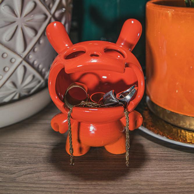 Sunset orange Kidrobot Fine Ash Dunny 5-inch ceramic ashtray figure with detailed design and smooth finish.