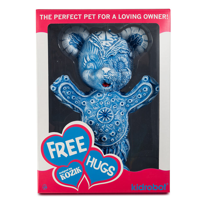 Blue edition Free Hugs Bear art figure by Frank Kozik, vinyl collectible sculpture with expressive design and detailed features.