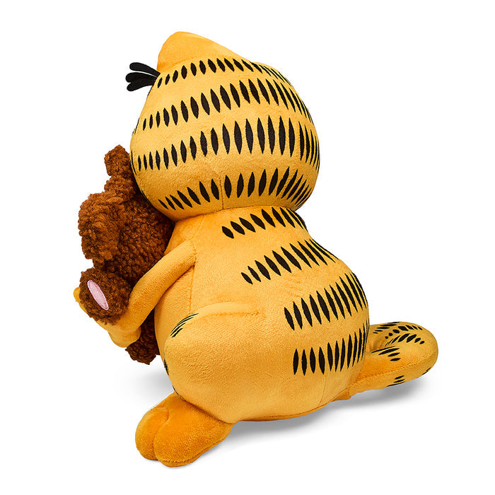 Medium Garfield and Pooky plush toys by Kidrobot, featuring Garfield's orange fur and Pooky's brown plush in a soft, cuddly design.