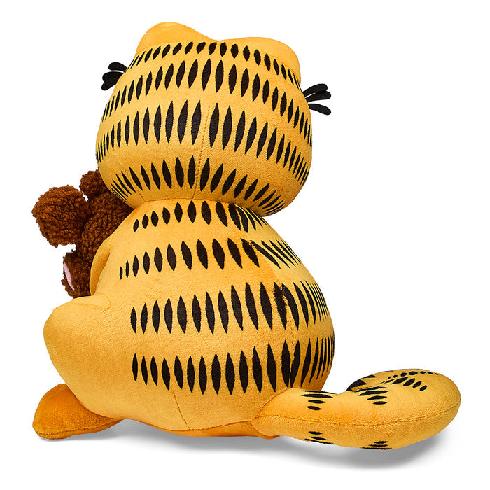 Medium Garfield and Pooky plush toys by Kidrobot, featuring Garfield's orange fur and Pooky's brown plush design.