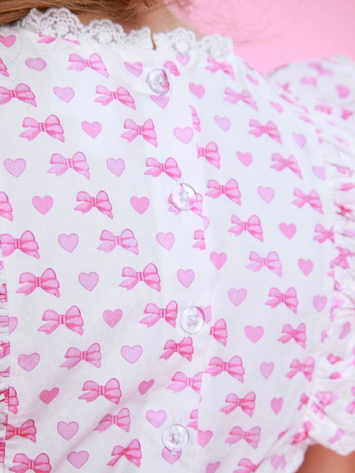 Back detail of girls dress with button closure