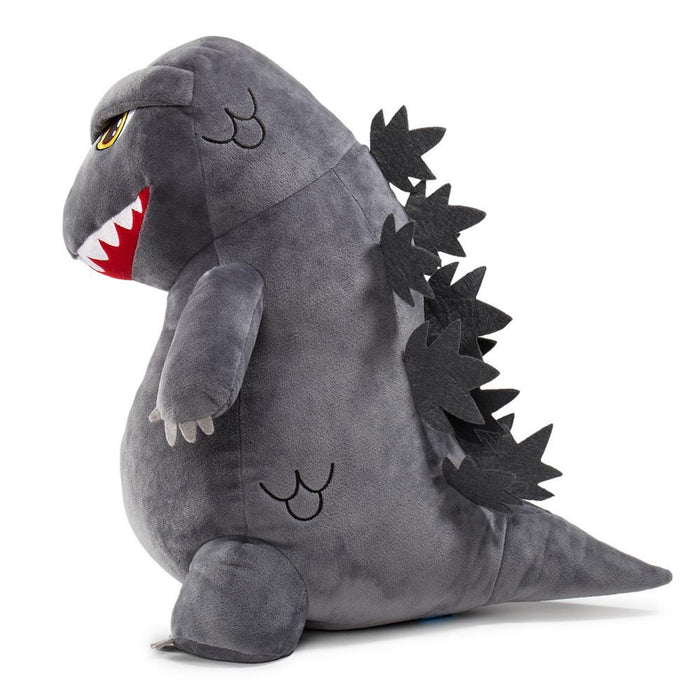 Godzilla 16-inch HugMe vibrating plush toy by Kidrobot, soft plush with vibrating feature, detailed Godzilla design for fans.