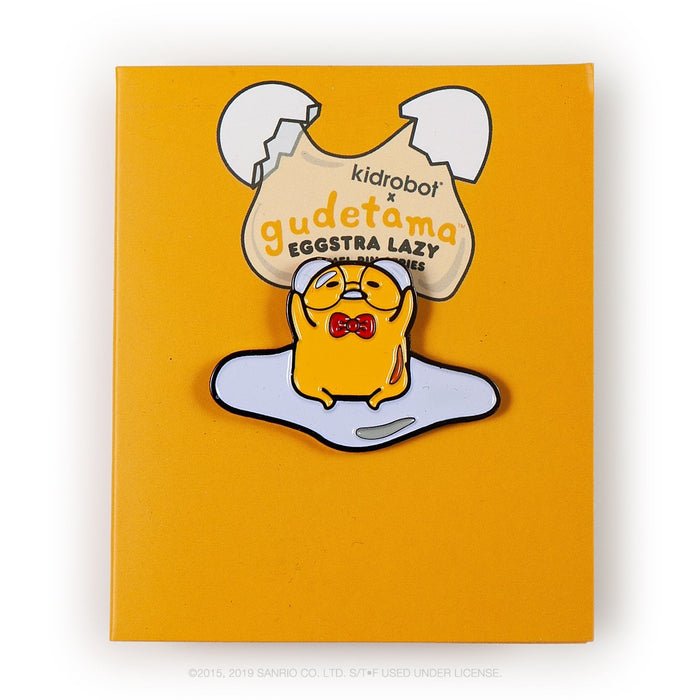 Gudetama Eggstra Lazy enamel pin from Kidrobot x Sanrio series, featuring a cute, laid-back egg character in a blind box packaging.