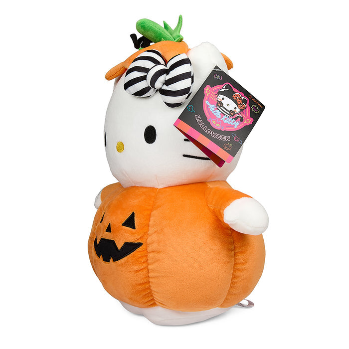Sanrio Hello Kitty 13-inch Halloween plush in pumpkin costume, soft and cuddly with festive Halloween detailing.