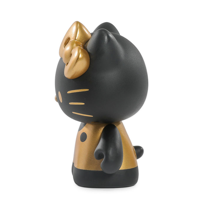 Hello Kitty® black and gold limited edition 3-inch vinyl art figure by Sanrio, featuring detailed design and collectible appeal.