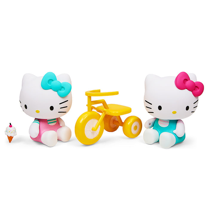 Hello Kitty vinyl art figures by Kidrobot featuring a tricycle and ice cream theme, with colorful Hello Kitty character and accessories.
