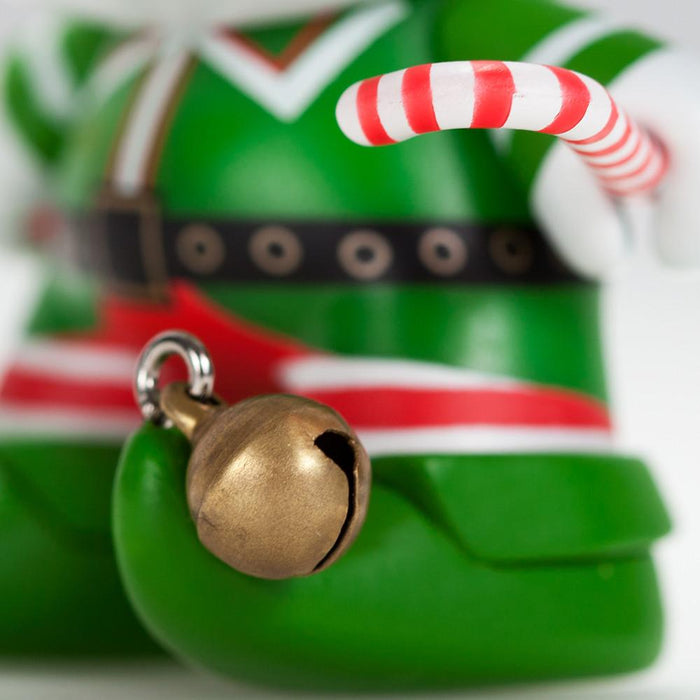 Holiday Grumpy Elf 3-inch Dunny vinyl figure with a grumpy facial expression and festive elf attire on a white background.