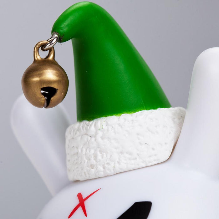 Holiday Grumpy Elf 3-inch Dunny vinyl figure featuring a mischievous elf with a grumpy expression and festive holiday attire.