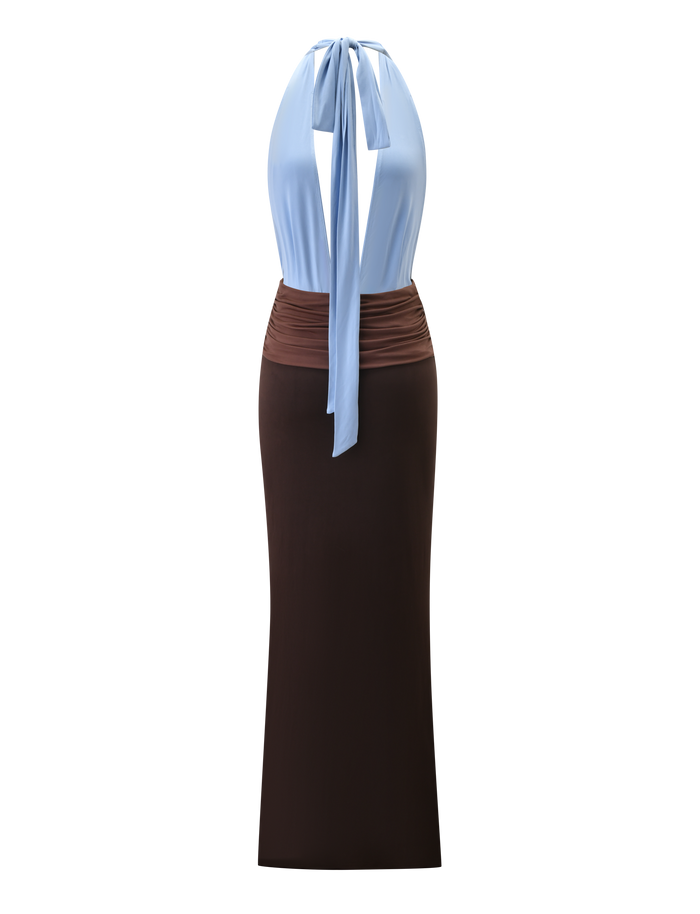 The JENNI PLUNGE MAXI DRESS by TIGERMIST features a colour-block design with a sleeveless light blue halter top tied at the neck, a ruched brown waistband, and a long, fitted dark brown skirt, shown against a white background.