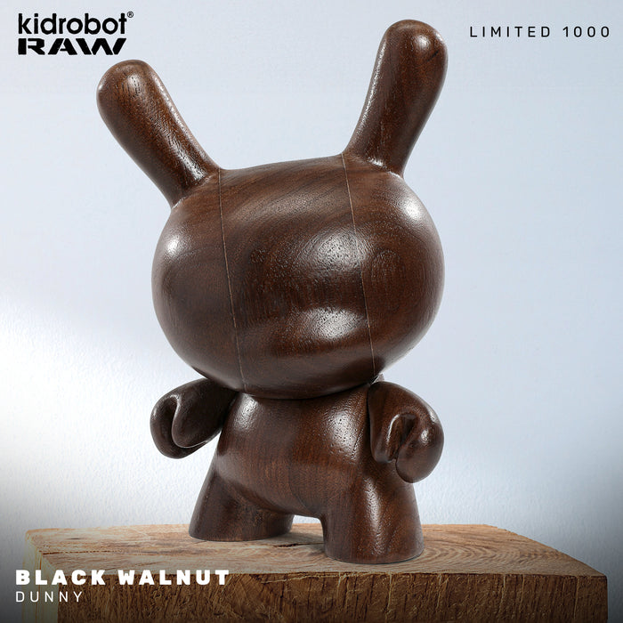Kidrobot RAW Black Walnut 8-inch wood Dunny toy with natural wood grain finish, limited edition collectible sculpture.