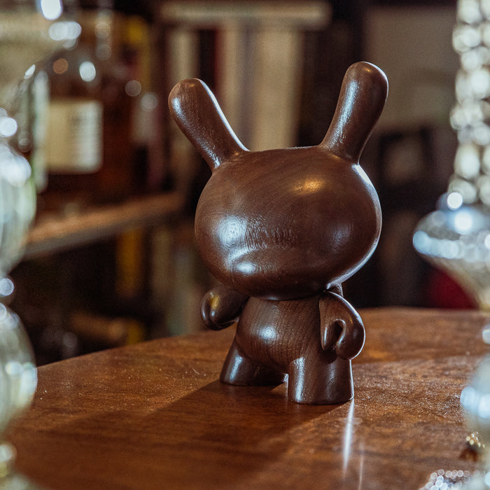 Kidrobot RAW Black Walnut 8-inch wood Dunny figure with dark walnut finish, limited edition collectible art toy.