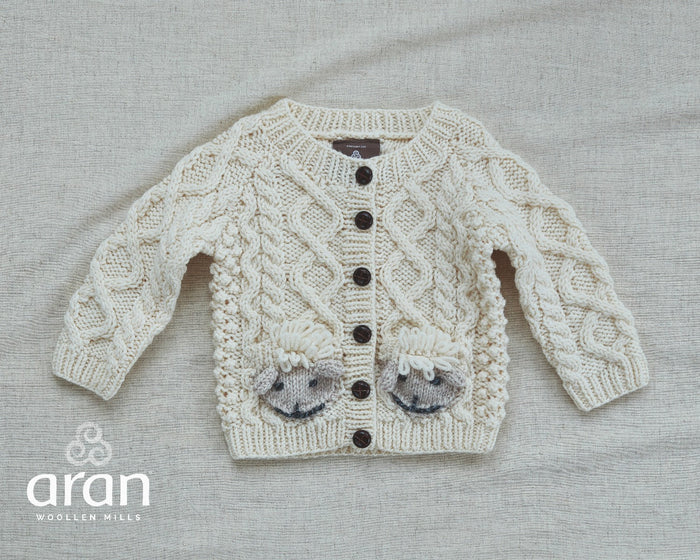 handknit_cardigan_with_sheep_83588d7e-5a2a-492a-a74c-1d11ff5c77f9.jpg