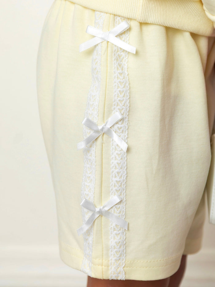 Girls yellow casual outfit with lace ribbon details