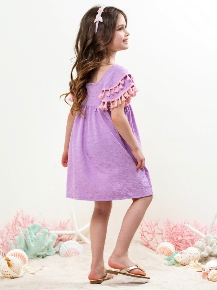 girls lavender textured dress with pink tassels