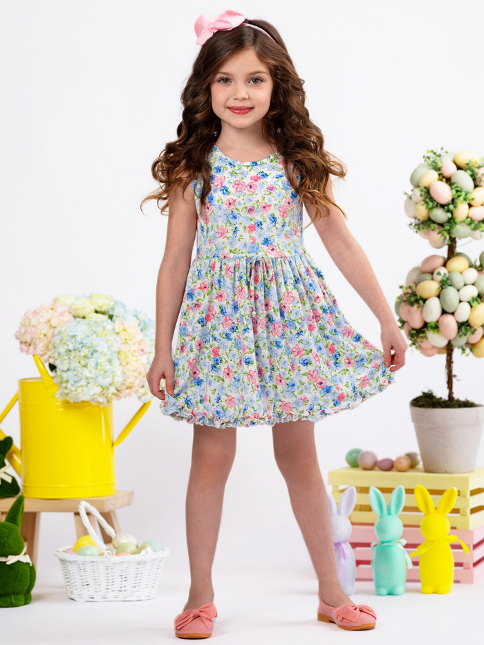 Girls sleeveless floral dress with matching women’s puff sleeve floral dress