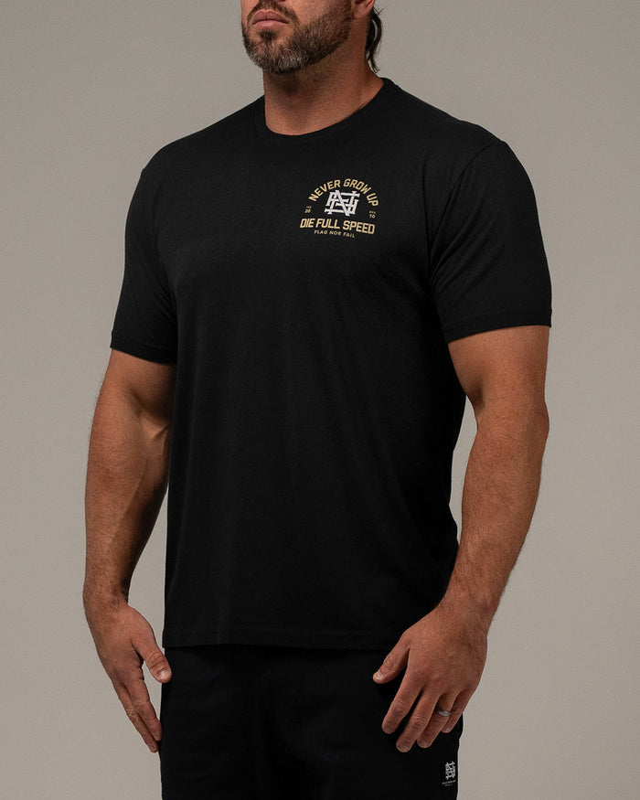 NEVER GROW UP TEE - BLACK