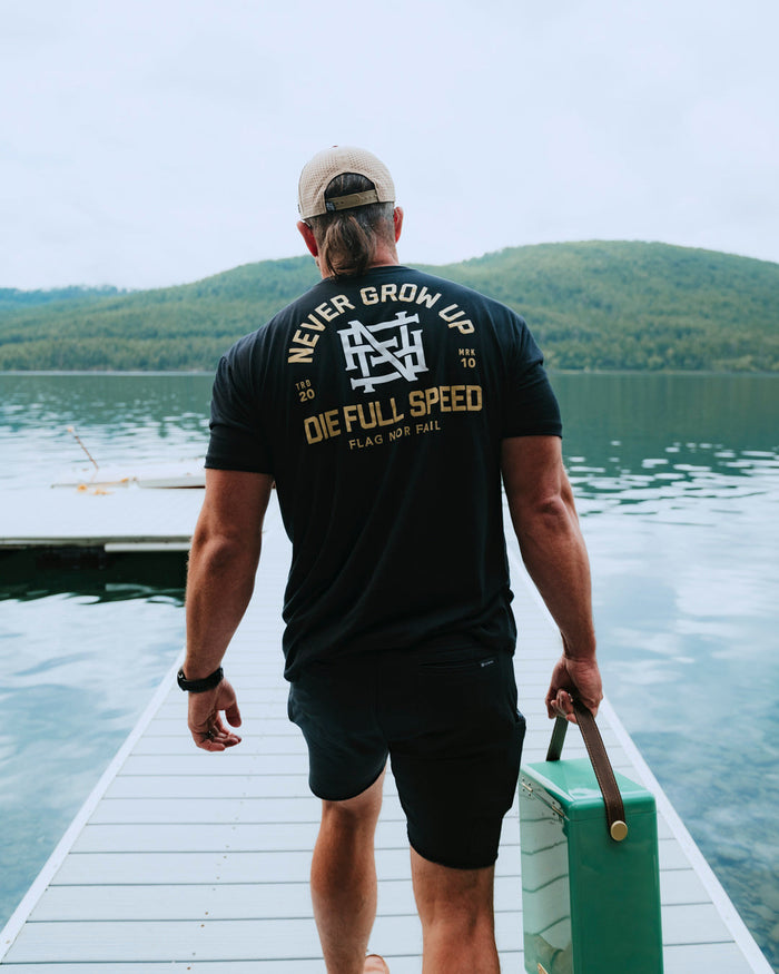 NEVER GROW UP TEE - BLACK