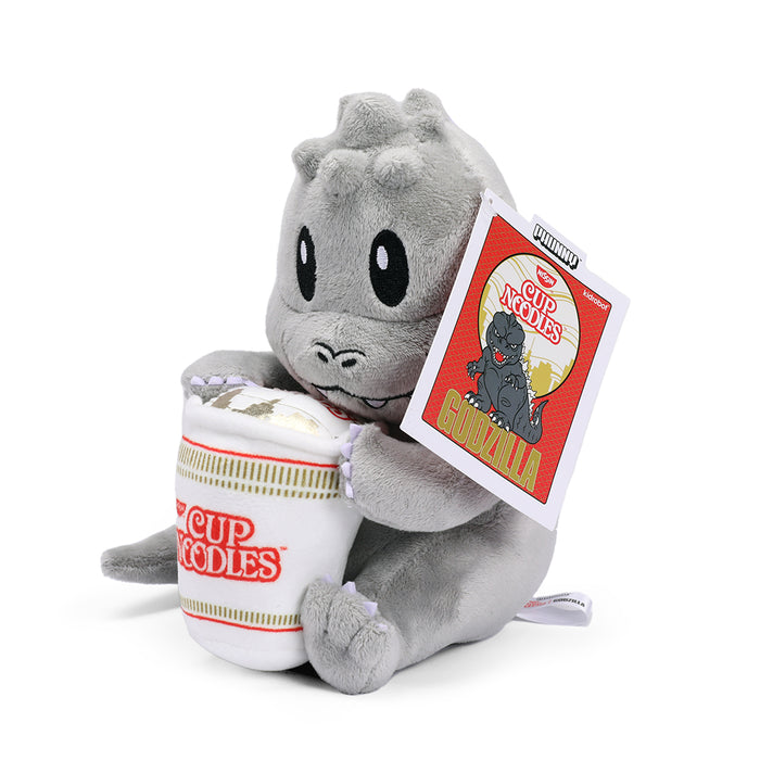 Godzilla Phunny plush toy holding a Nissin Cup Noodles, featuring a colorful Godzilla design and soft, cuddly fabric.