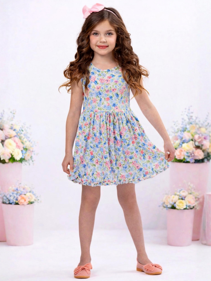 Girl wearing a pastel floral dress for spring celebrations