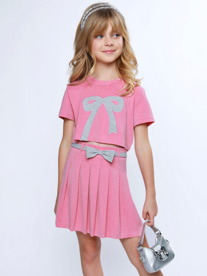 Girls pink bow top with pleated skirt featuring fixed belt bow detail and side zipper