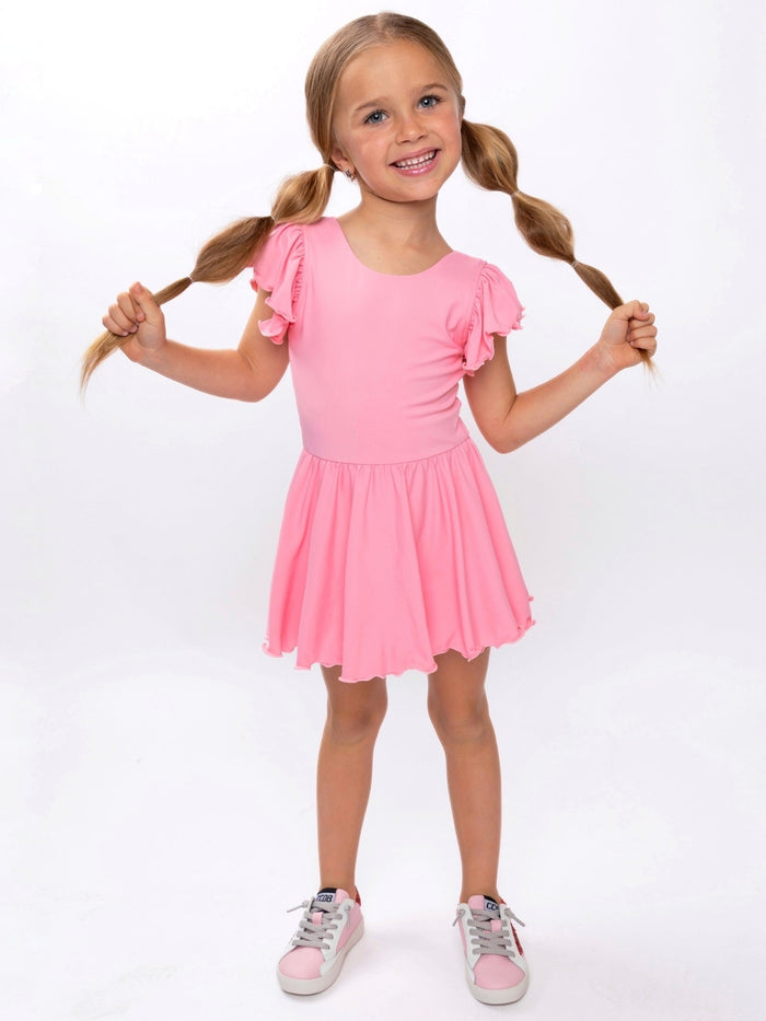 Girls athletic-inspired pink dress with flowy skirt
