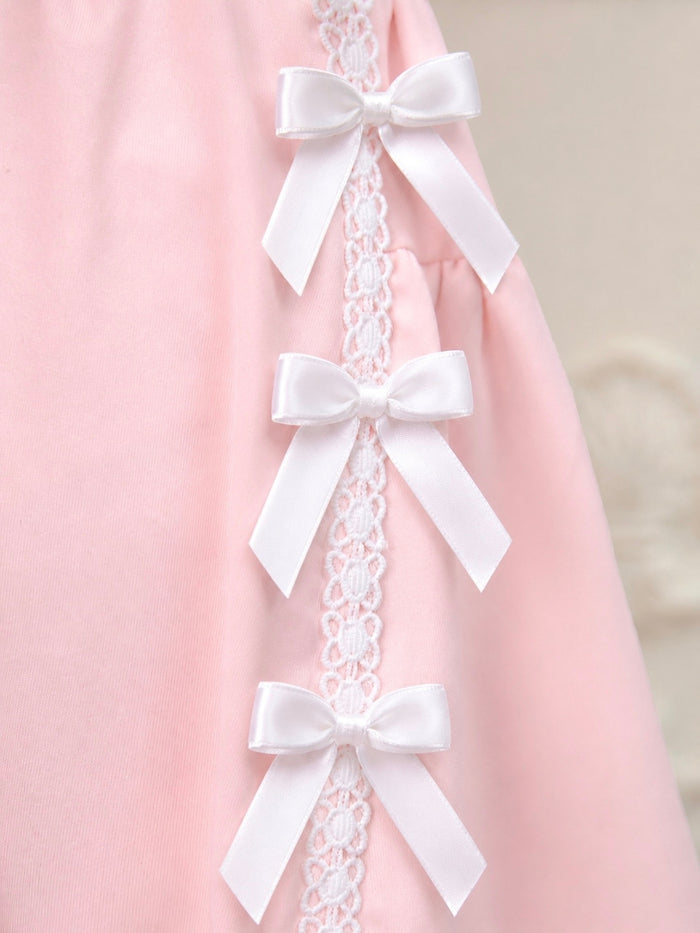 Girls matching skirt set featuring lace ribbon bow accents