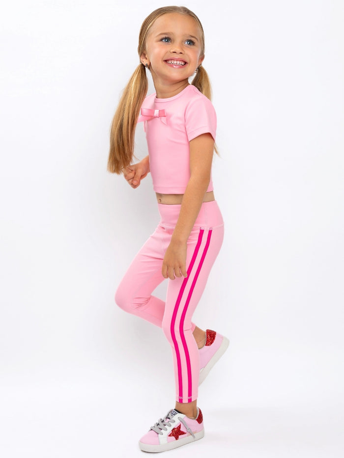 Girls pink sporty outfit with high-waisted leggings