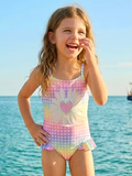 Girls vacation swimsuit with bright colors and ruffle accents