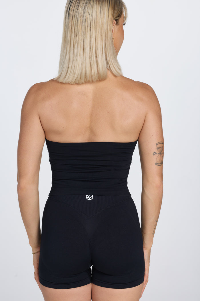 Seamless halter neck tank top, with supportive built in bra, U neck design and open back, with PEPPAMINT centre chest branding in black