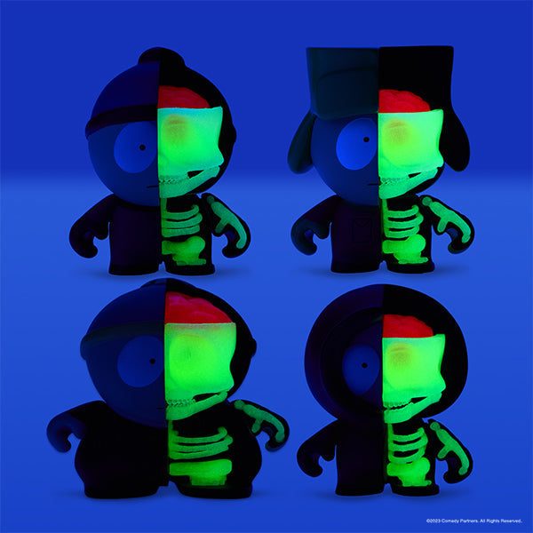 Set of four South Park Anatomy Boys vinyl art figures by Kidrobot, featuring glow-in-the-dark details, displayed together.