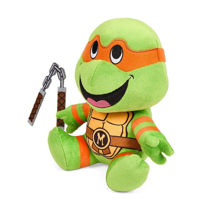 Teenage Mutant Ninja Turtles Michelangelo 7.5-inch Phunny plush toy with orange mask and detailed turtle features.